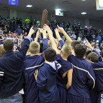 The Ohio County Eagles hold up their trophy in front of OCHS fans after winning the Third Region tournament Saturday night at the Owensboro Sportscenter.