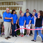 Centertown mayor Larry Smith, second from left, cuts the ribbon for the official grand opening of the Centertown Community Building.