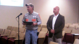 Jason Ward of the Kentucky Transportation Cabinet, right, presented Jeff Miller a certificate from the state recognizing him as an official county road foreman at the last Fiscal Court meeting on Nov. 26.