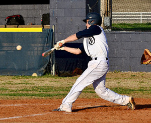 Eagle Tristan Lykins hits a line drive during OC's 3-2 win over Owensboro Thursday evening.
