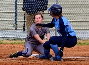 OC third baseman Katie Martin tags out a Logan County baserunner during the Lady Eagles' loss to Logan County Thursday evening at OCHS.