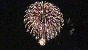 Fireworks explode over Ohio County Park during the July 4, 2014 Sparks In The Park event.