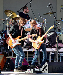 Beaver Dam-native Brandon Crawford, front-left, Drew Aud, front-right and Coty Burton of the band Insulated opened the first ever concert at the newly constructed Beaver Dam Amphitheater on Saturday, Oct.4.