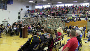 Lieutenant. Colonel Mark Latham, instructor for the Ohio County High School JROTC program speaks to the crowd during the 2014 OCHS Veterans Day program.