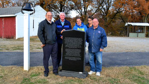 The Ohio County Poor Farm Cemetery monument placed at the Ohio County Community Golf Course. Pictured L-to-R: Judge-Executive David Johnston, Magistrate Kenny Autry, Kristina Chapman, Renetta Romero and Earl Jones.