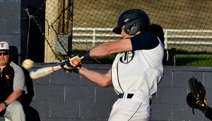 OC senior Jake Griffin puts the ball in play during the Eagles' win over Owensboro Monday night.