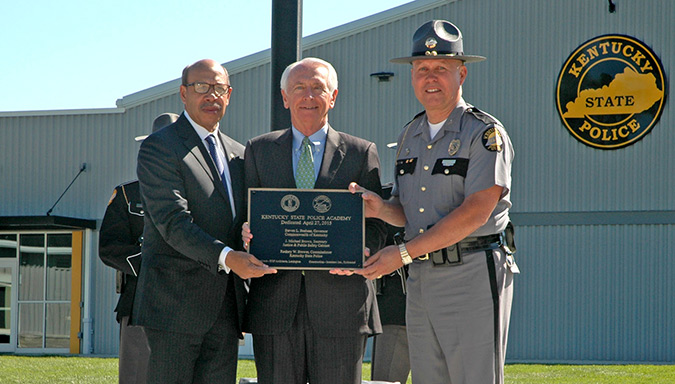 Governor Steve Beshear (center) joined Justice and Public Safety Secretary J. Michael Brown (left) and Kentucky State Police Commissioner Rodney Brewer (right) to dedicate the new KSP Training Academy in Frankfort on April 27.