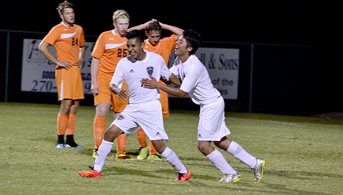 Eagles Pascual Perez, left, and Alex Acosta celebrate a Perez goal.